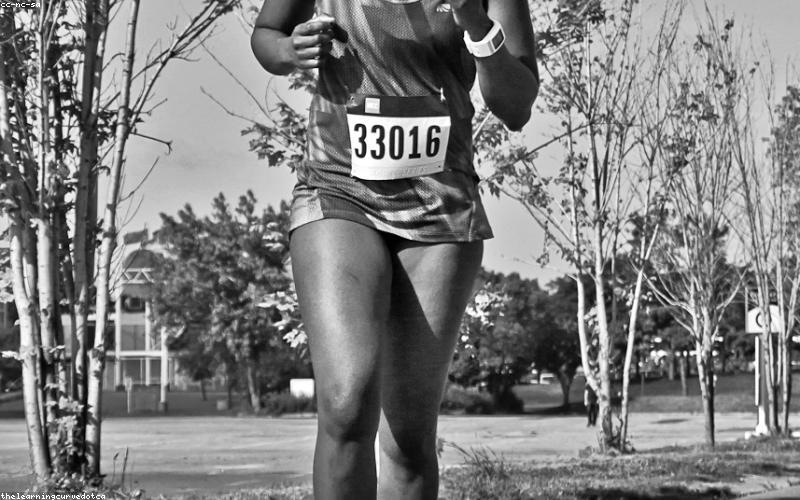 An iftar table brimming with colorful fresh fruits, dates, a pitcher of refreshing homemade lemonade, and a small bowl of chana chaat, looking vibrant and healthy.