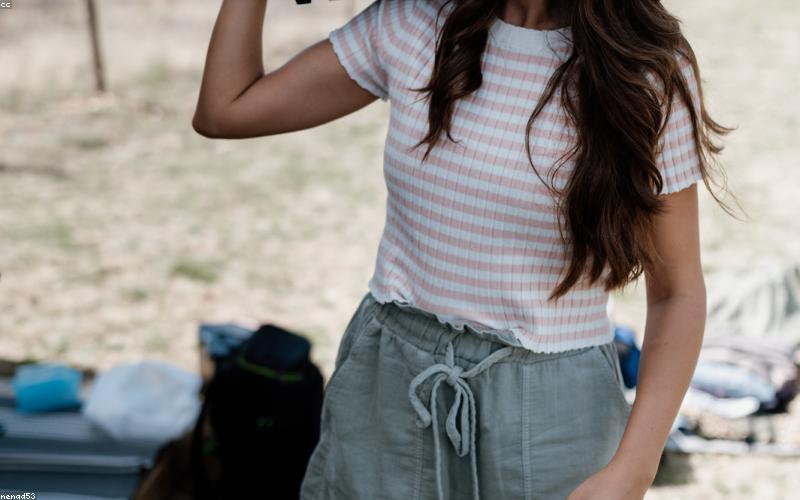 A happy family or friends sharing a Karahi meal, laughing and enjoying.