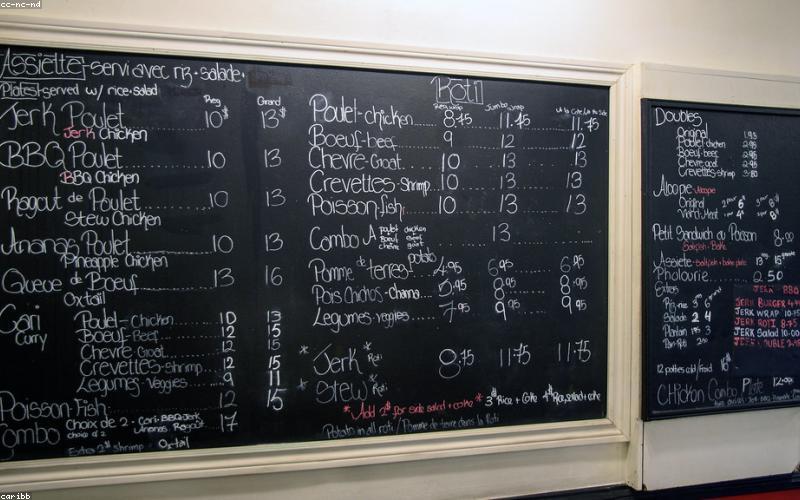 A beautifully plated Dhaba Style Chicken Karahi, garnished with fresh ginger, coriander, and a slice of lemon, served with hot naan or roti.