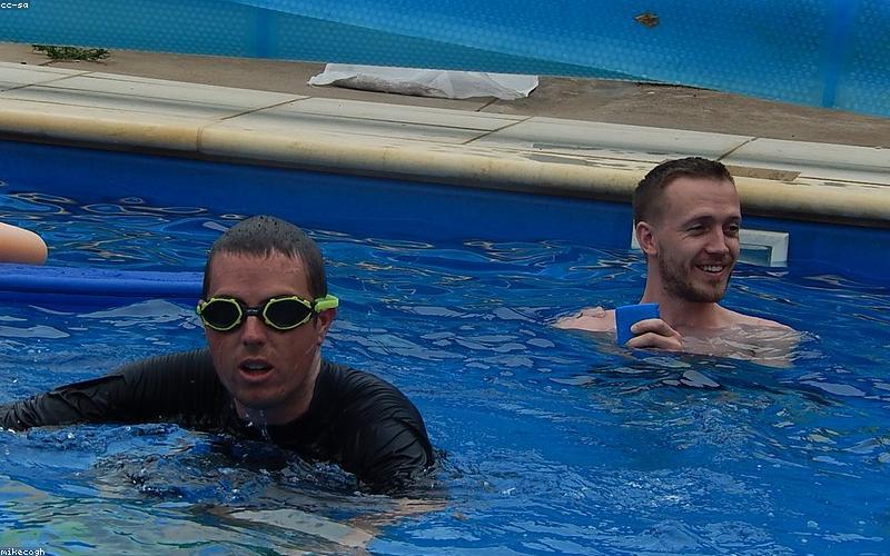 A happy Pakistani family enjoying a healthy Iftar together, smiling.