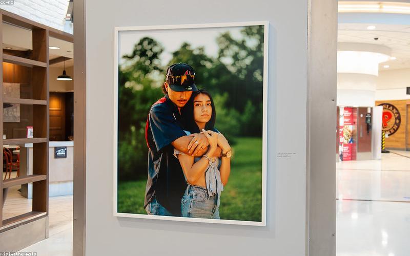 Close-up of hands intensely playing a mobile game on a smartphone with a high refresh rate display.