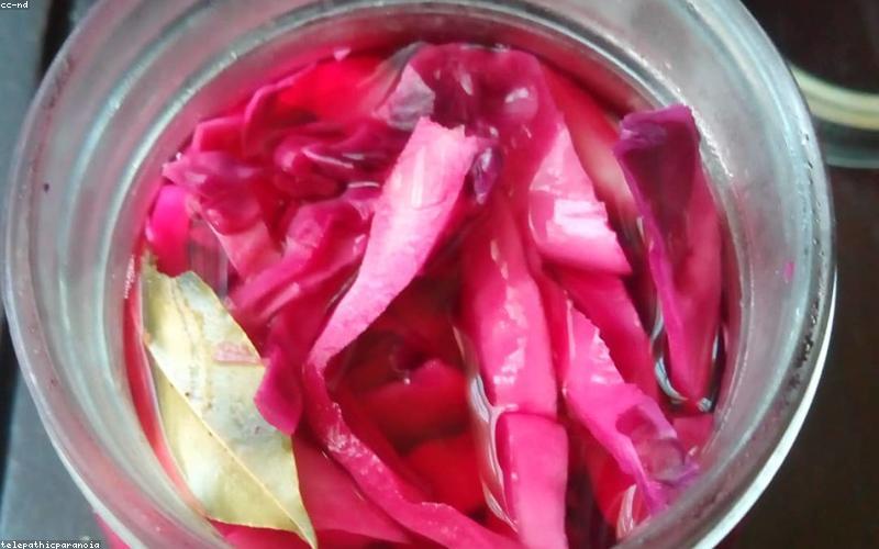 Beautifully plated Chicken Karahi served in a traditional metal karahi with fresh naan bread and a side salad