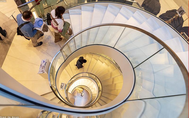 People excitedly looking at new smartphones in a store