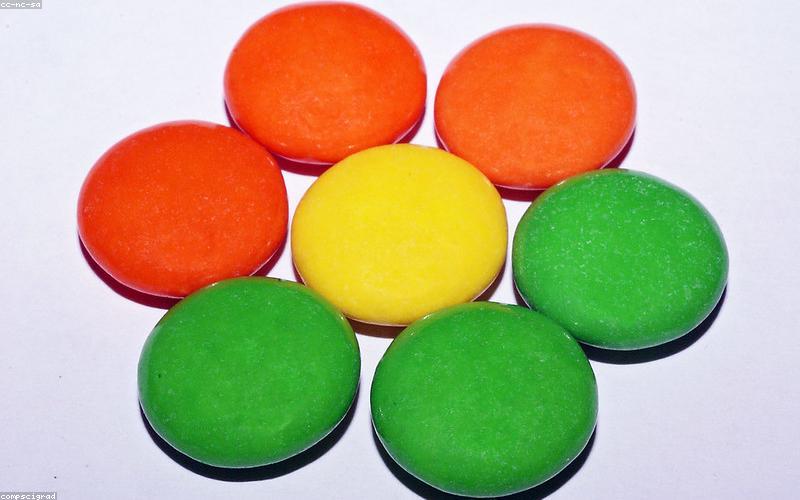 A vibrant, bustling modern cafe interior in Lahore, filled with young patrons chatting and laughing, with stylish lighting.