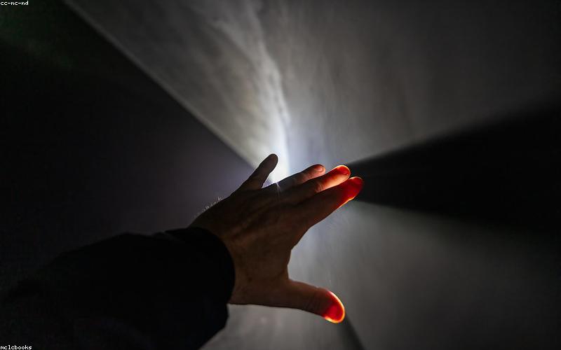 A smartphone screen displaying a popular Pakistani social media app or a mobile game, held in a hand.