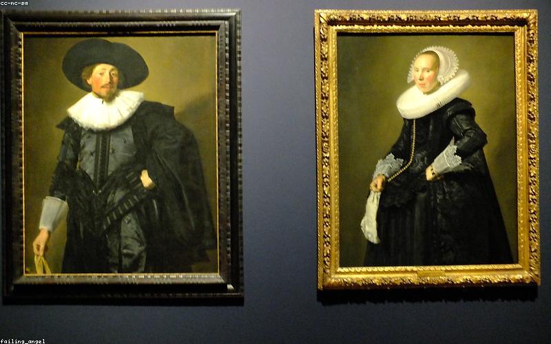 Chicken pieces frying in a traditional karahi with oil