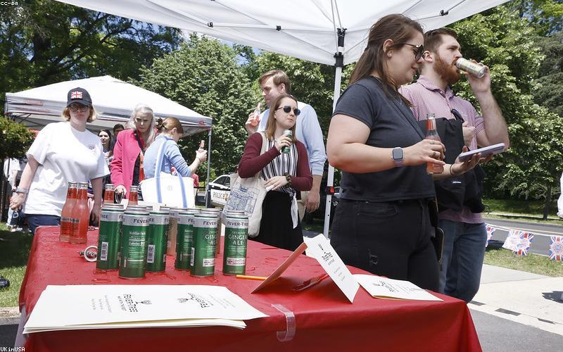 The final, steaming hot Chicken Biryani, garnished with fried onions, mint, and lemon wedges, ready to be served