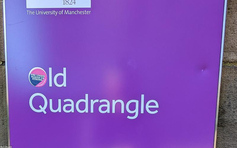 Close-up shot of a beautifully cooked Chicken Handi, garnished with ginger juliennes and fresh green chilies, served in a traditional clay handi pot with steam rising.