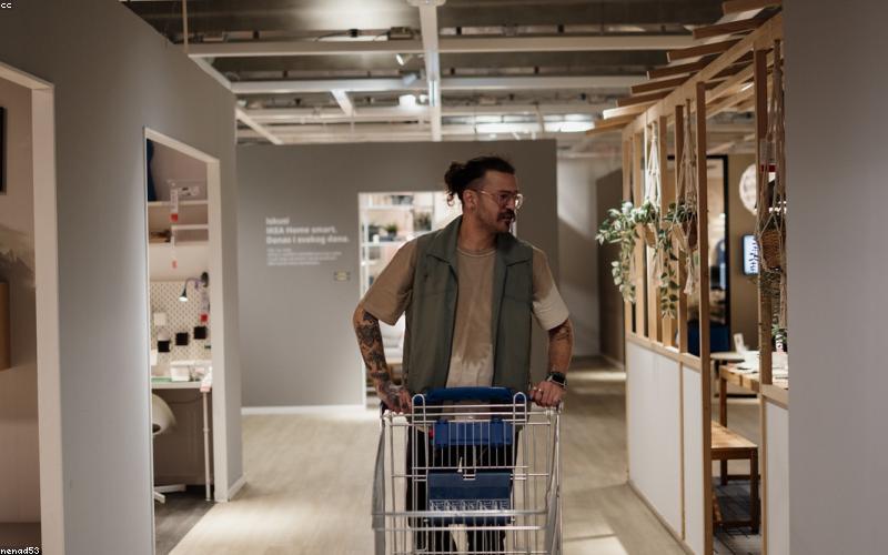 A family enjoying a light and healthy Iftar, featuring fruit chaat, salads, and grilled items.
