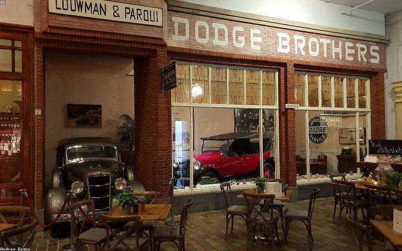 Close-up of different types of solar panels and inverters displayed in a showroom