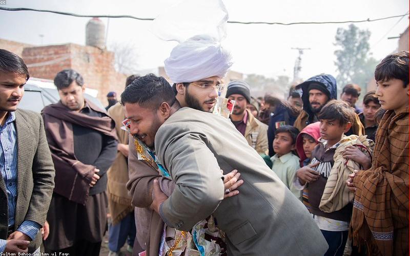 A close-up shot of someone harvesting fresh vegetables from their rooftop garden in Faisalabad.